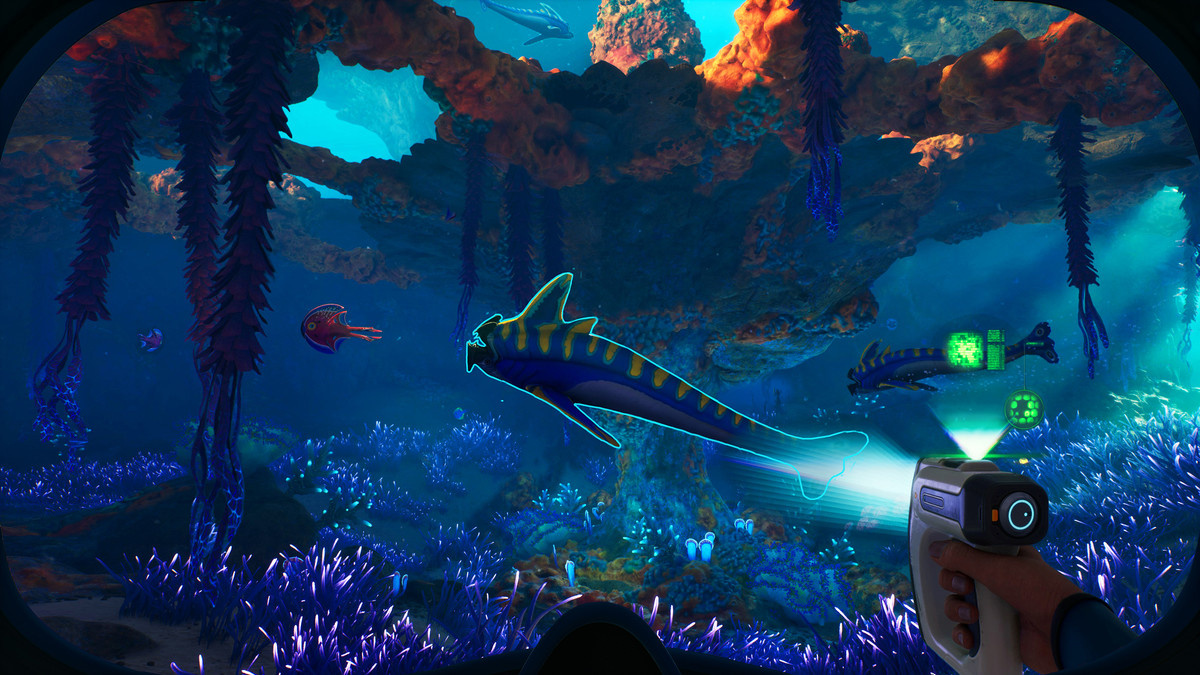 A sea creature gets scanned by a bioscanner in ‘Subnautica 2’.