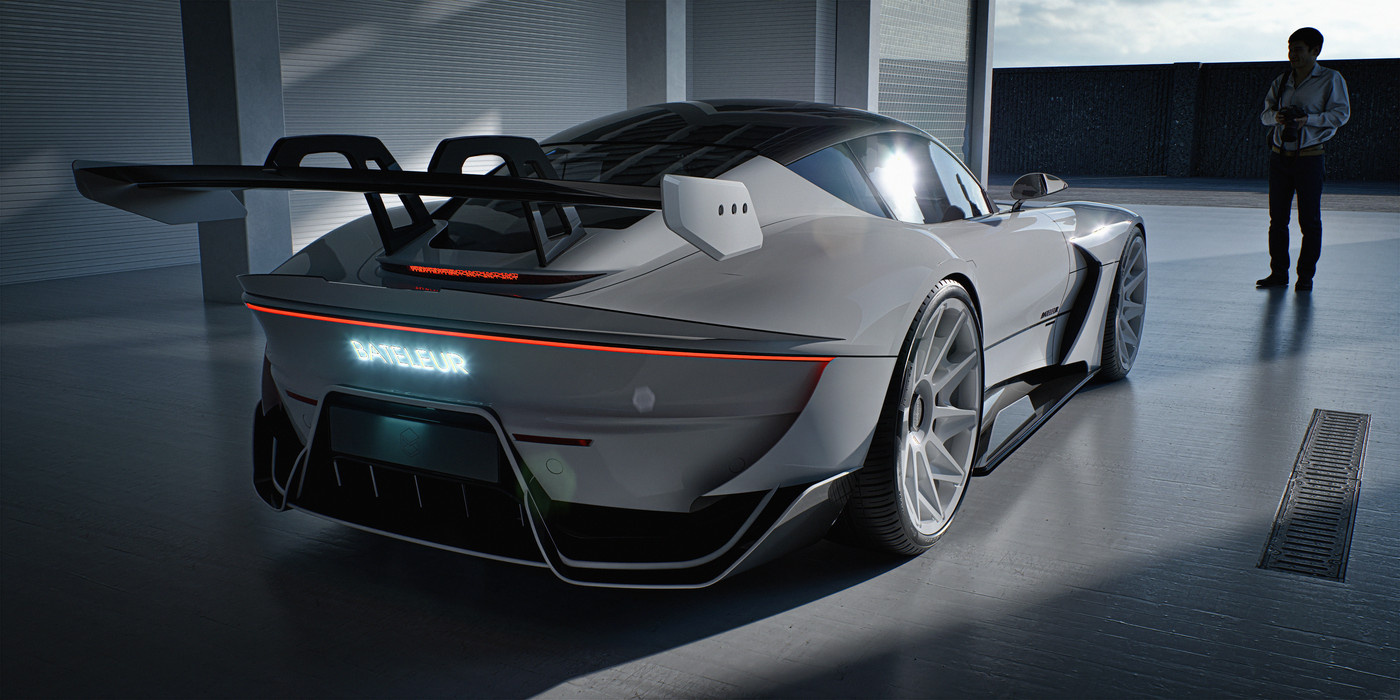 Rendered silver Bateleur concept car in garage, with a man standing nearby.