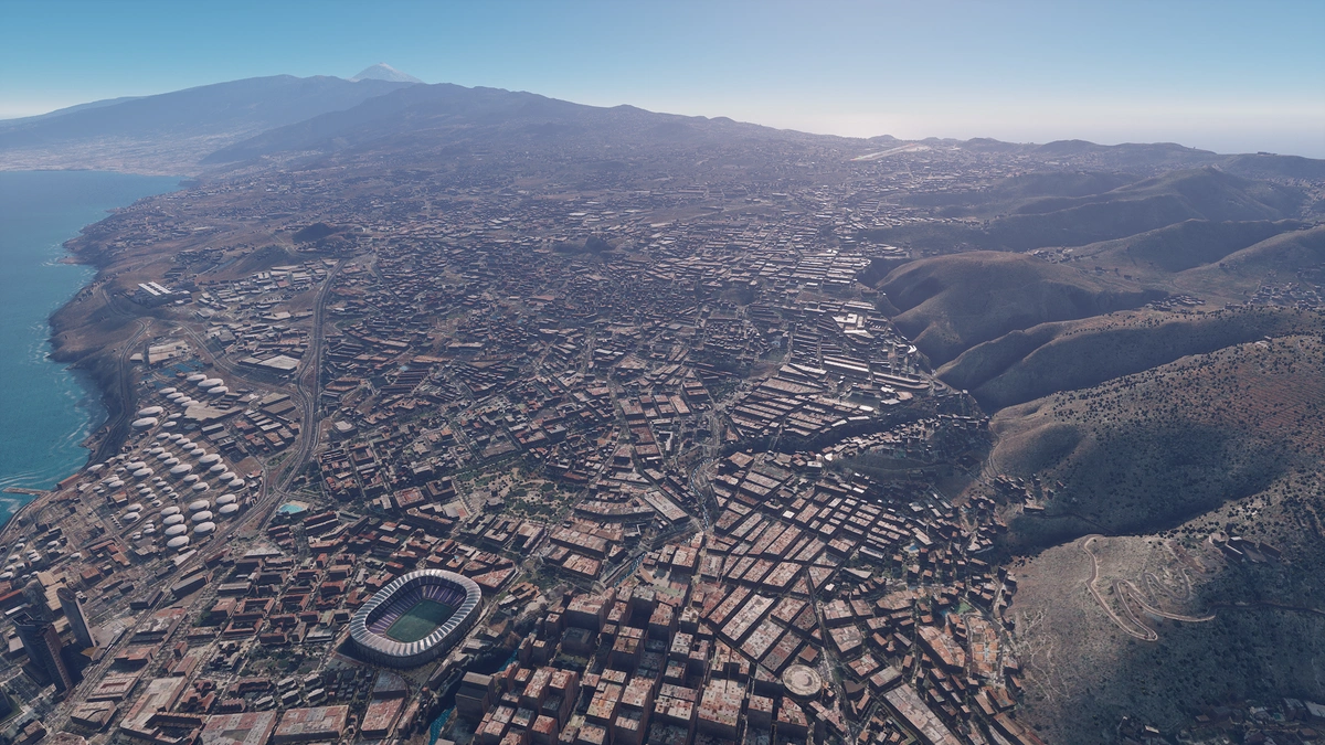 Aerial view of 3D city and mountain environment in Entrol ENVISION.