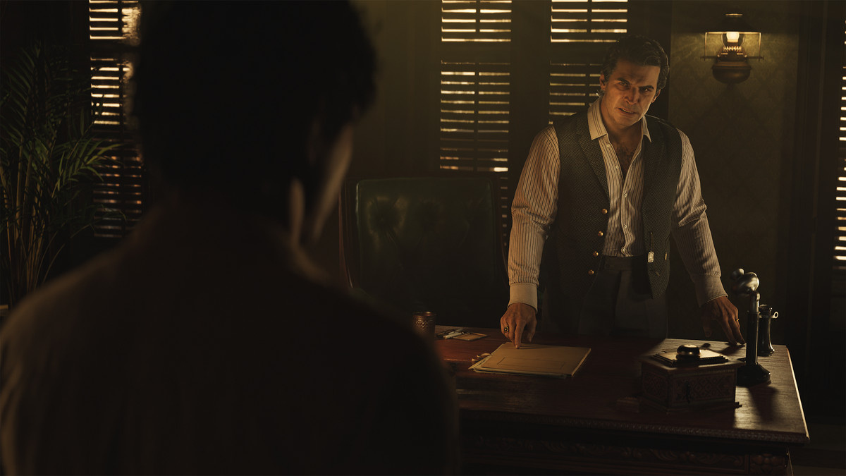 A character behind a desk in ‘Mafia: The Old Country’.
