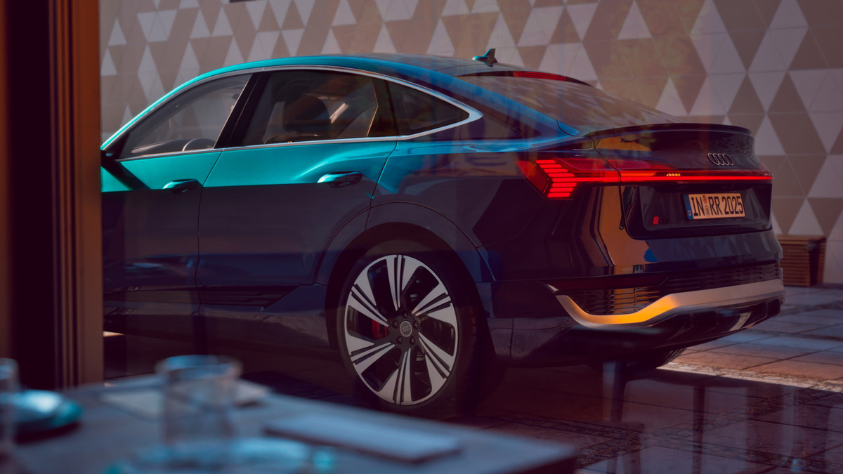 The back half of a blue Audi e-tron lit in UE5 by Renderoom.