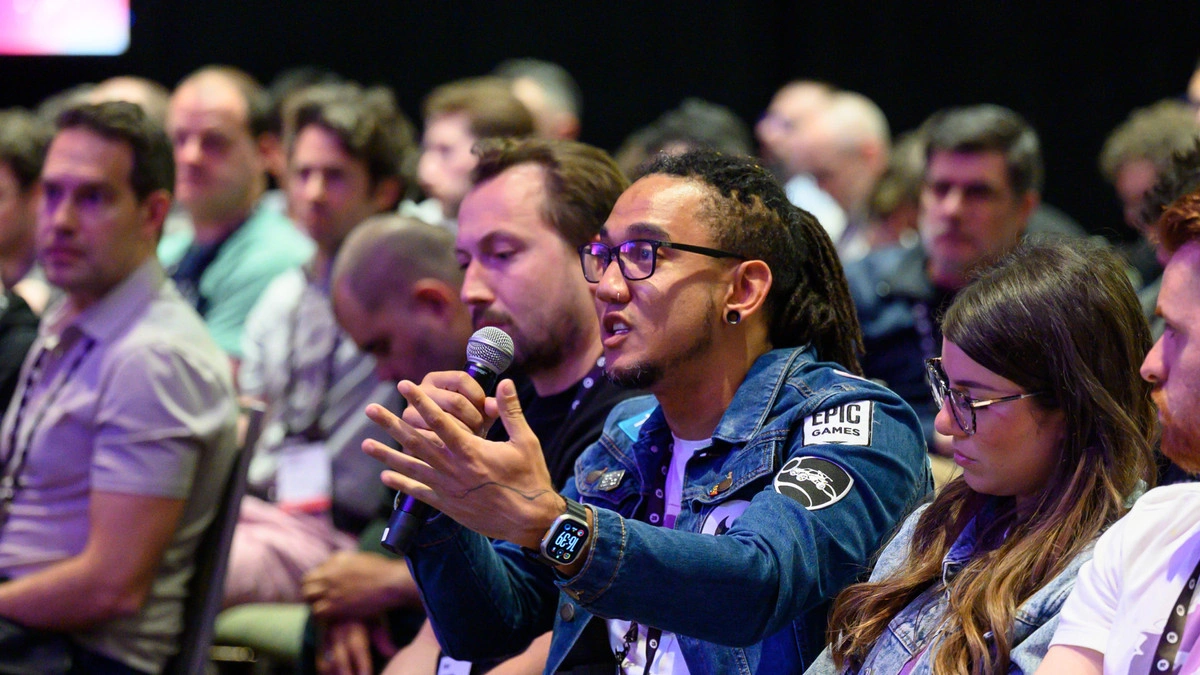 An audience member asks a question in a session at Unreal Fest.