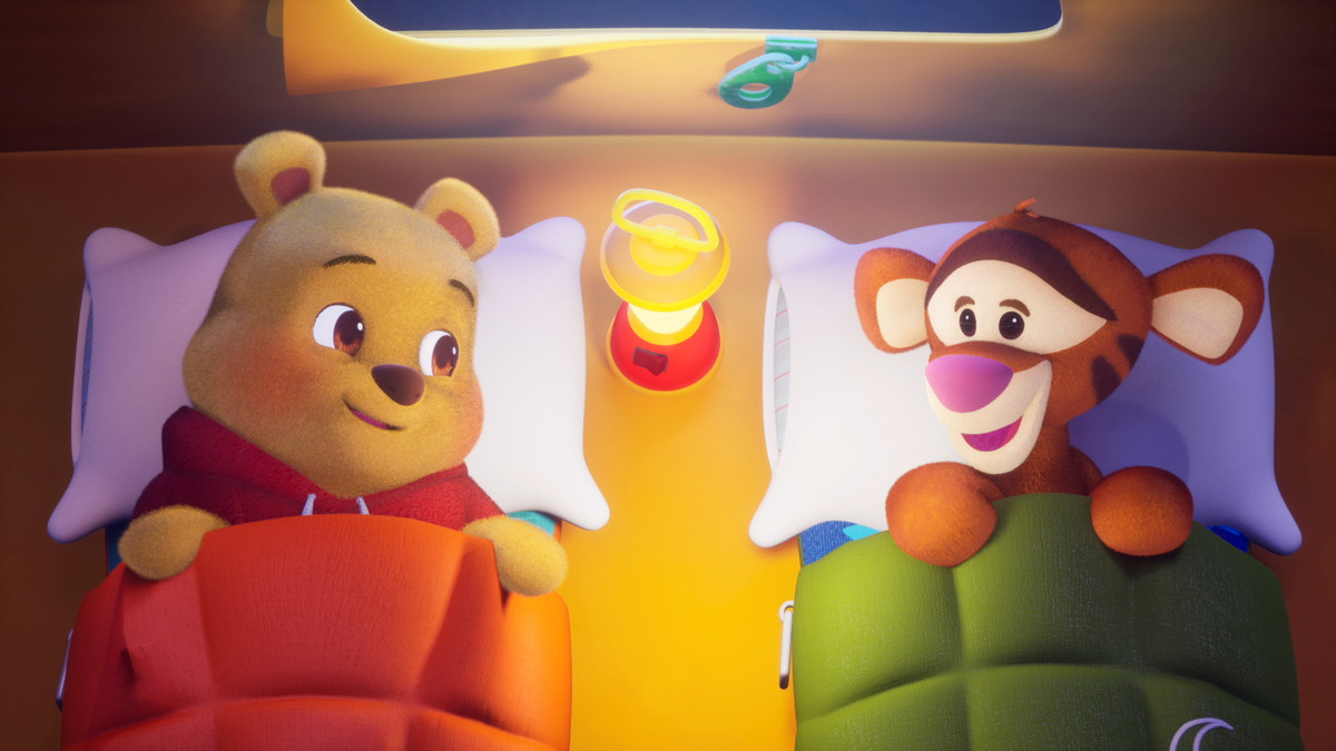 Pooh and Tigger in bed in ‘Playdate with Winnie the Pooh’.