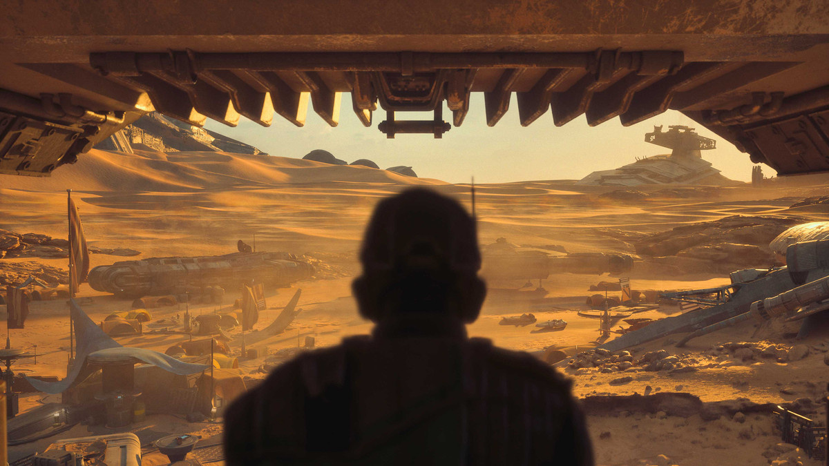 Un homme observe un circuit de course dans le désert dans STAR WARS: Galactic Racer.