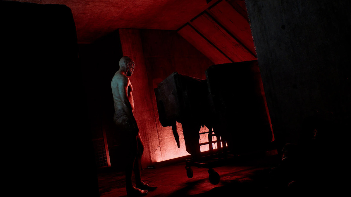 Un villageois muté dans une pièce faiblement éclairée de SILENT HILL: Townfall.
