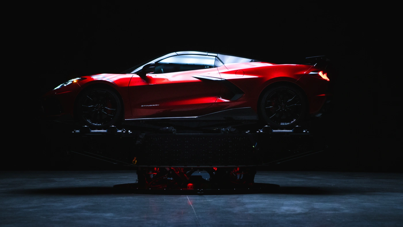 A sports car on the PXO AKIRA motion platform