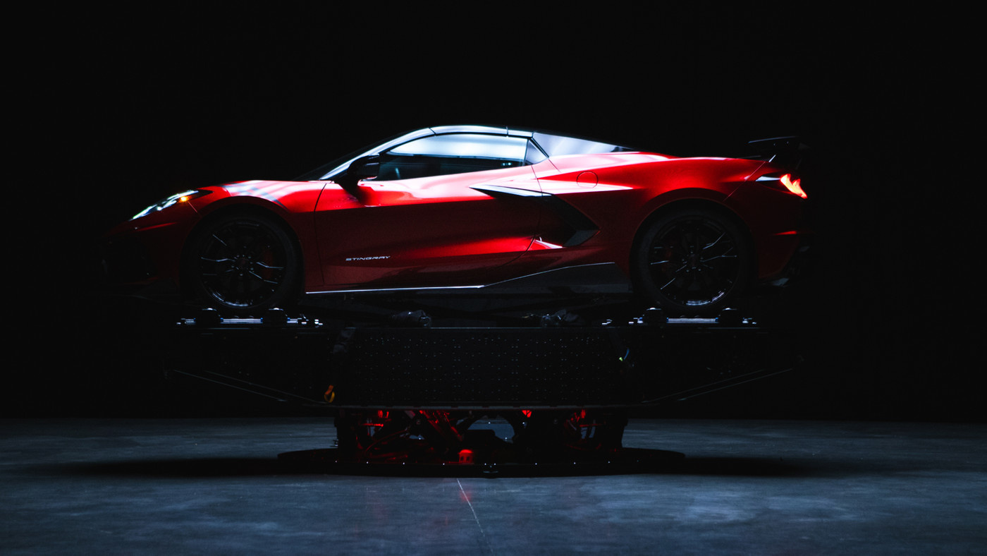 A sports car on the PXO AKIRA motion platform
